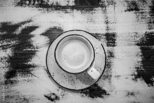 cup with cappuccino on the table photo