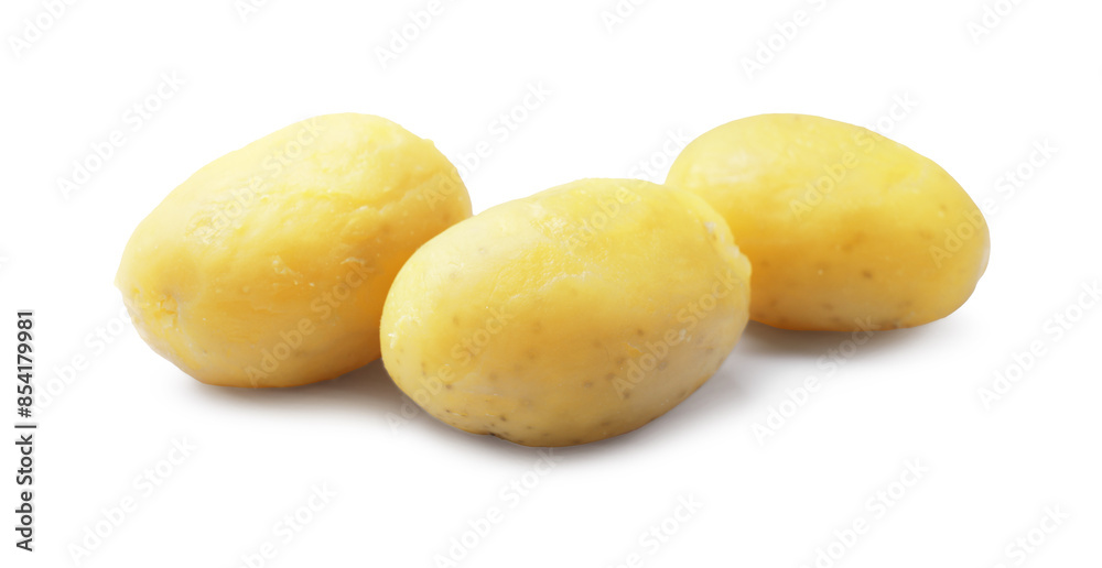Three young boiled potatoes isolated on white Three young boiled potatoes isolated on white