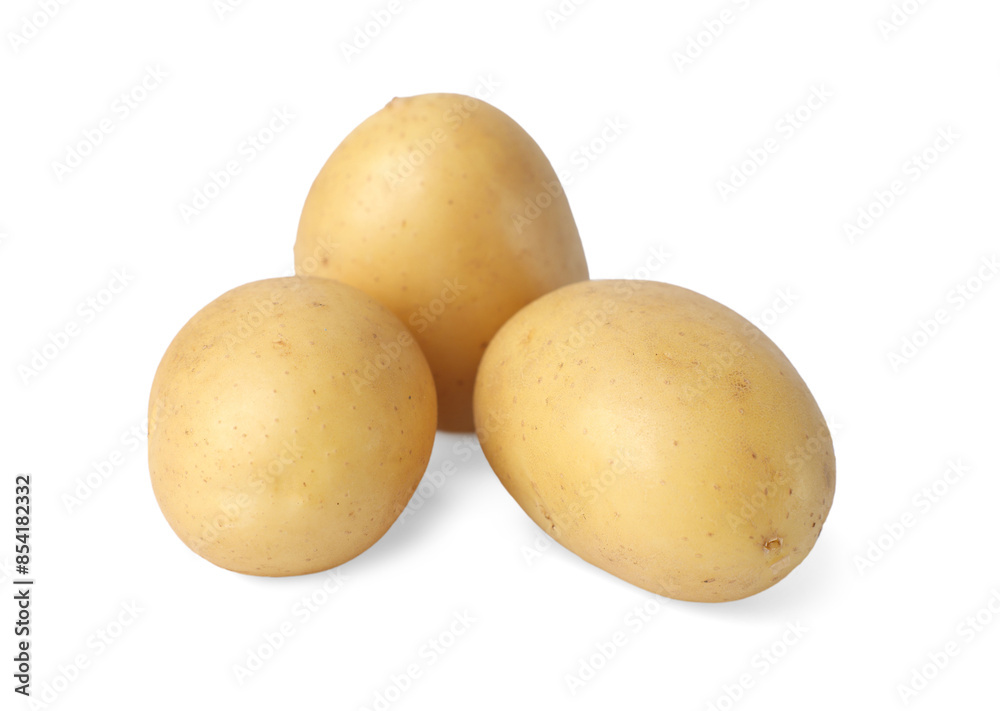 Whole fresh raw potatoes isolated on white Whole fresh raw potatoes isolated on white