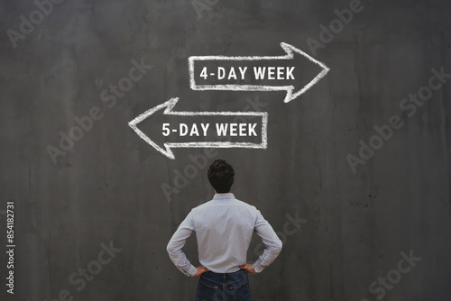 4-day work week vs 5 day workweek concept with business man looking at arrows signs,  five-day week or four-day, friday off photo