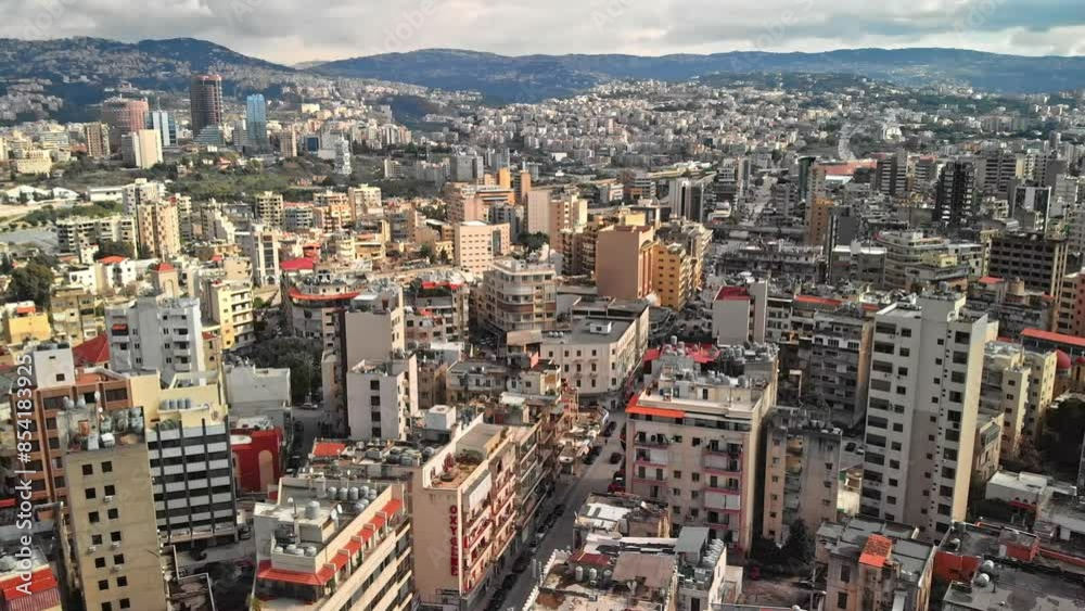 Aerial View of Beirut, Lebanon, Showing Cityscape and Green Space on a Sunny Day