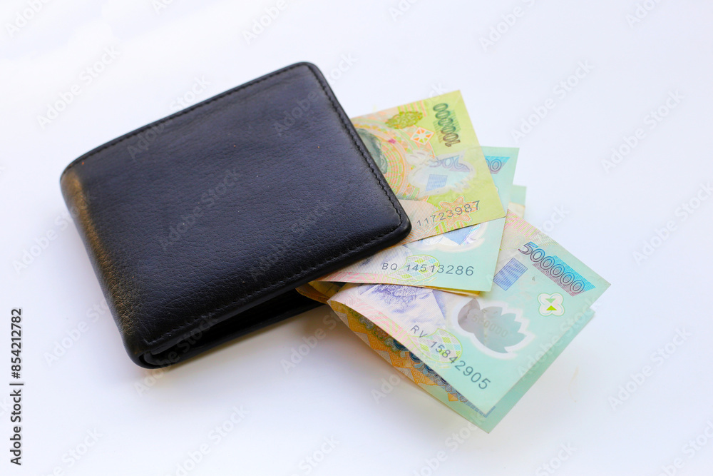 Vietnamese dong banknotes on yellow background. Vietnamese dong banknotes on yellow background.