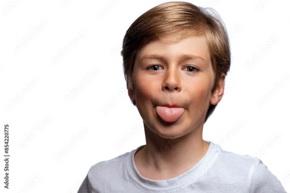 Portrait of handsome boy showing tongue, isolated on white background Portrait of handsome boy showing tongue, isolated on white background