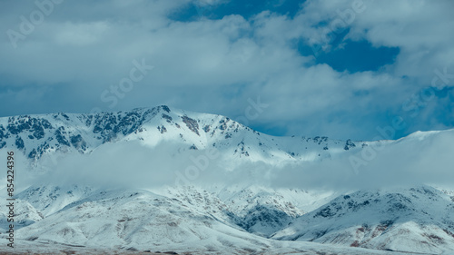 Wallpaper Mural Beautiful landscape with snowy mountain tops in cloudy weather Torontodigital.ca