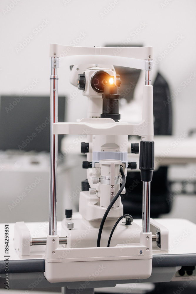 The concept of new ophthalmological and modern technologies, diagnostics and vision treatment. Interior of a modern ophthalmology clinic with modern equipment.