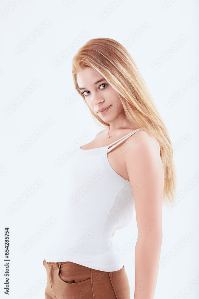 Fototapeta premium Attractive young woman posing on white background