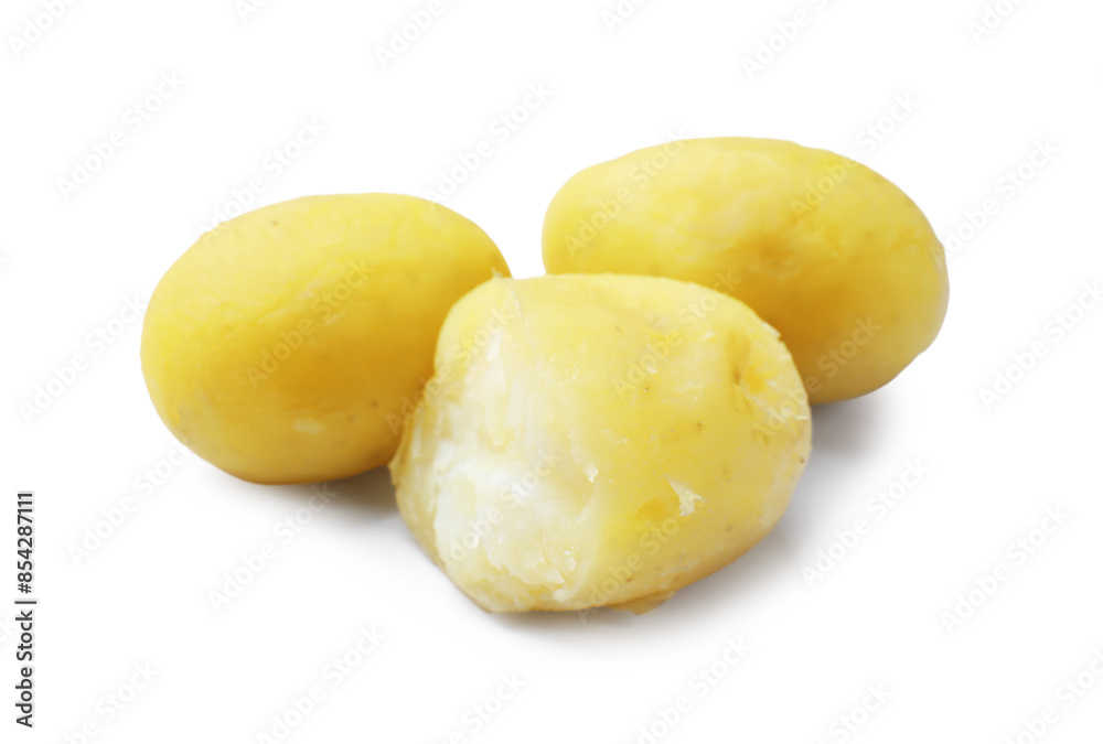 Three young boiled potatoes isolated on white Three young boiled potatoes isolated on white