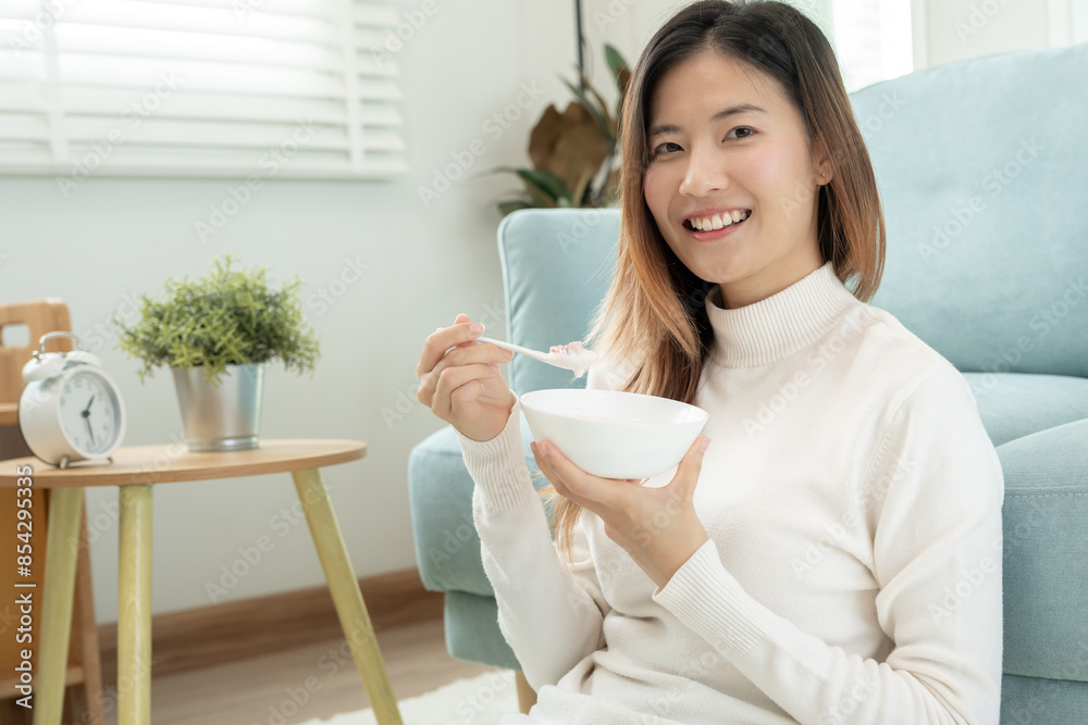 healthy food. Beautiful female girl enjoy eat yogurt, granola, fresh fruits on breakfast health in house. Happy young woman smile on morning good emotion. dieting, detox, diet, clean eat, vegetarian healthy food. Beautiful female girl enjoy eat yogurt, granola, fresh fruits on breakfast health in house. Happy young woman smile on morning good emotion. dieting, detox, diet, clean eat, vegetarian
