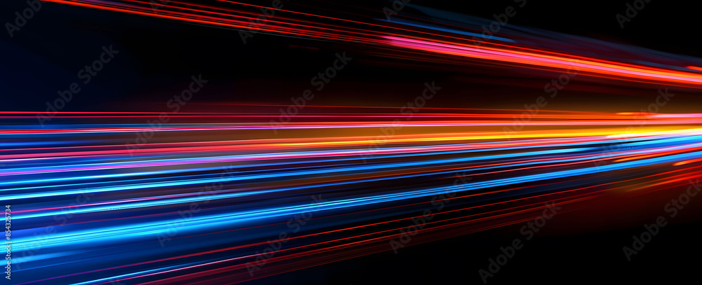 Abstract illustration depicting high-speed light trails in 3D, creating a dynamic and futuristic backdrop. The red and blue light motion trails convey a sense of fast movement and modern technology. Abstract illustration depicting high-speed light trails in 3D, creating a dynamic and futuristic backdrop. The red and blue light motion trails convey a sense of fast movement and modern technology.