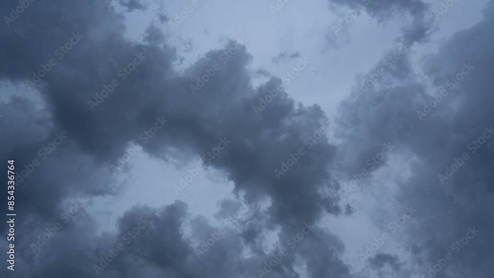Obraz premium Dark and Dramatic Storm Clouds Area Background