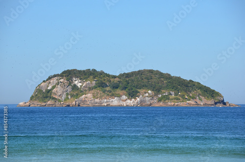 Wide view of Alfavaca island from the viewpoint at Praia da Barra da Tijuca, a paradise in Rio de Janeiro, Brazil. photo