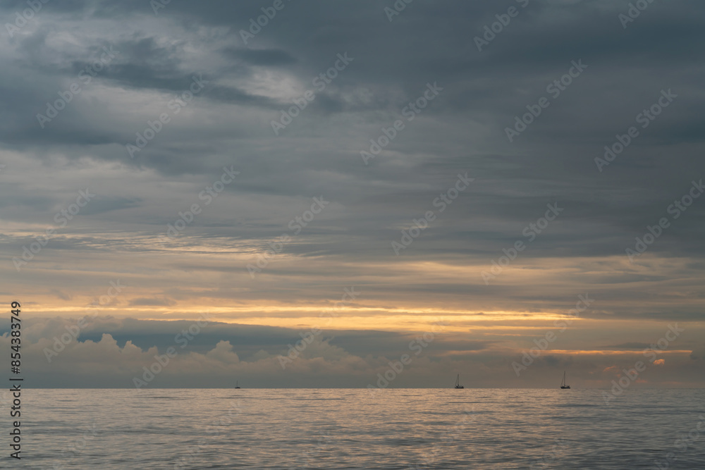 View of the Black Sea on the coast of Sochi against the sunset sky, Sochi, Krasnodar Krai, Russia View of the Black Sea on the coast of Sochi against the sunset sky, Sochi, Krasnodar Krai, Russia