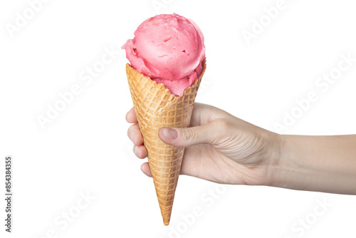 фотографія Woman's hand holding waffle cone with strawberry ice cream isolated on white or