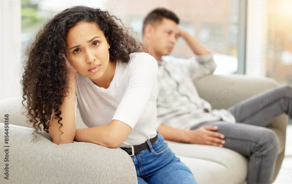 Angry, divorce and portrait of couple on sofa in argument for affair, cheating or disagreement. Upset, breakup and face of annoyed woman fighting with man for marriage fail in living room at home. Angry, divorce and portrait of couple on sofa in argument for affair, cheating or disagreement. Upset, breakup and face of annoyed woman fighting with man for marriage fail in living room at home.