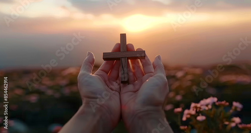 person praying at sunset