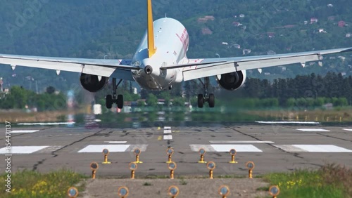 Passenger air plane arriving airport. Aircraft landing runway. Comfortable fast airplane travel. Aviation concept. Jet fly high sky. Airliner flight. Fun summer journey. Long distance transportation.
