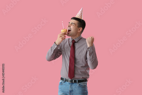 Happy young man with birthd...