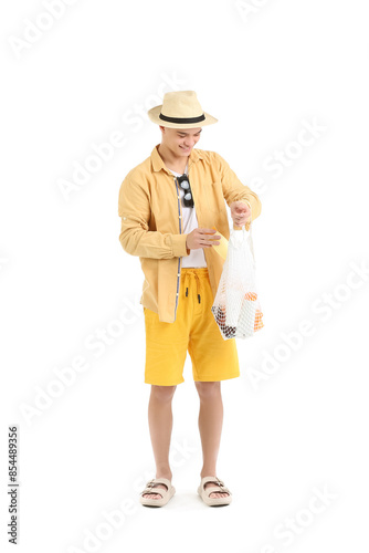 Happy young man with string...