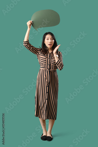 Shocked Asian woman with bl...