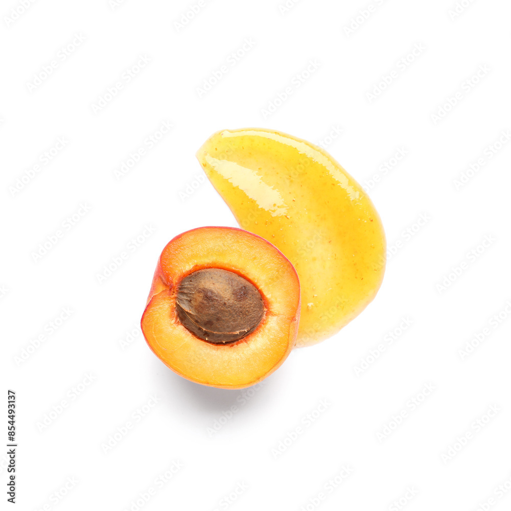 Sweet apricot and smear of jam on white background Sweet apricot and smear of jam on white background