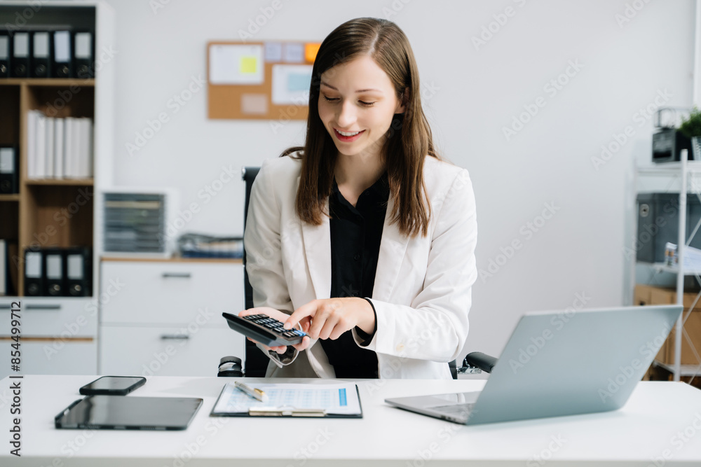 Working Process in Modern Office. Young Woman Account Manager Working at Table with New Business Project. . Working Process in Modern Office. Young Woman Account Manager Working at Table with New Business Project. .