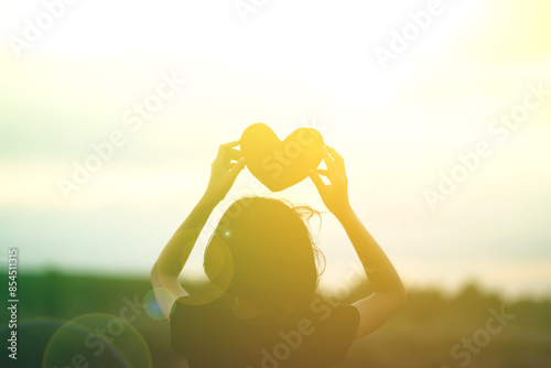 girl hands holding hearts silhouette