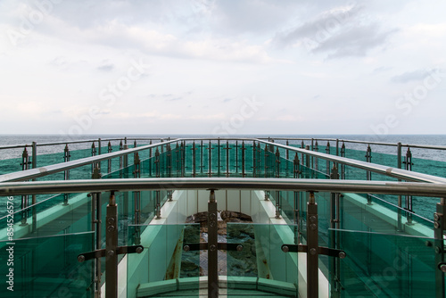 green observatory against the cloudy sea photo