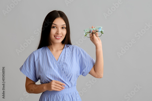 Beautiful young happy Asian...