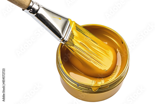 Close-up of a paintbrush dipped in yellow paint inside a can, symbolizing creativity and home improvement.