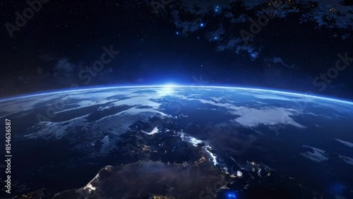 4K Looping Video: Earth View from Space, Curvature Highlighted with Sunrise or Sunset Glow, Clear Horizon Demarcation in Darkened Surface and Light Atmosphere