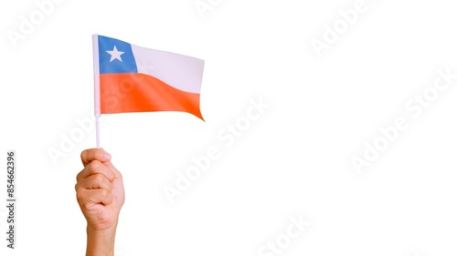 Cuadro en lienzo Wind waving a chilean pennant holding by a hand