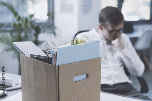 Fired office worker leaving the office