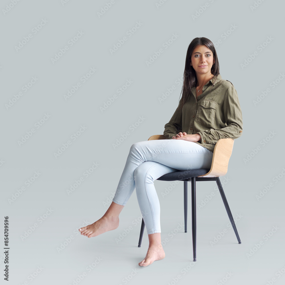 Beautiful woman sitting on a chair Beautiful woman sitting on a chair