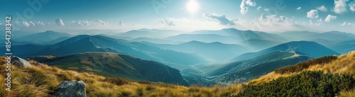 Mountain Range Panorama With Golden Grass and Blue Sky