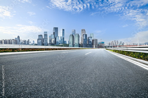 Empty asphalt road and cityscape in modern city
