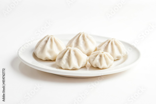 Close-up of Steamed Buns on White Plate