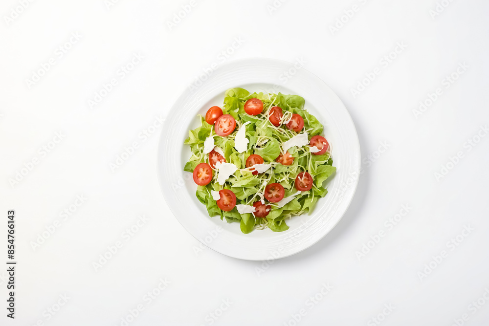 Fresh Green Salad with Cherry Tomatoes on White Plate Fresh Green Salad with Cherry Tomatoes on White Plate