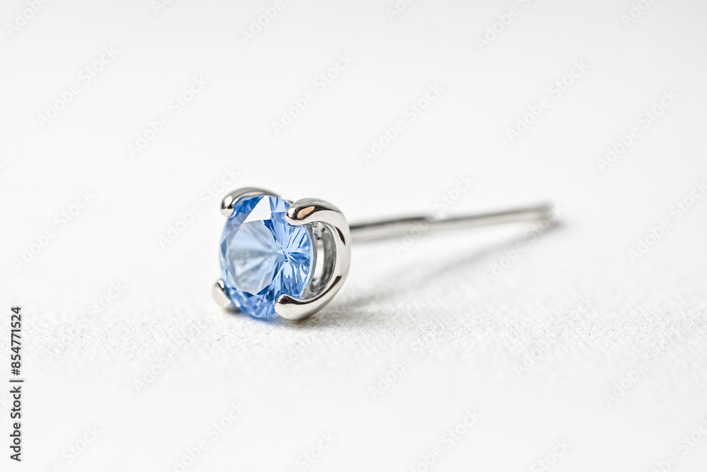 Closeup of a Blue Sapphire Earring Stud Closeup of a Blue Sapphire Earring Stud