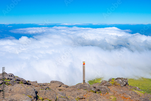 Morphological characteristics of the irregular relief and low-altitude clouds of Pico mountain in the Azores archipelago. photo