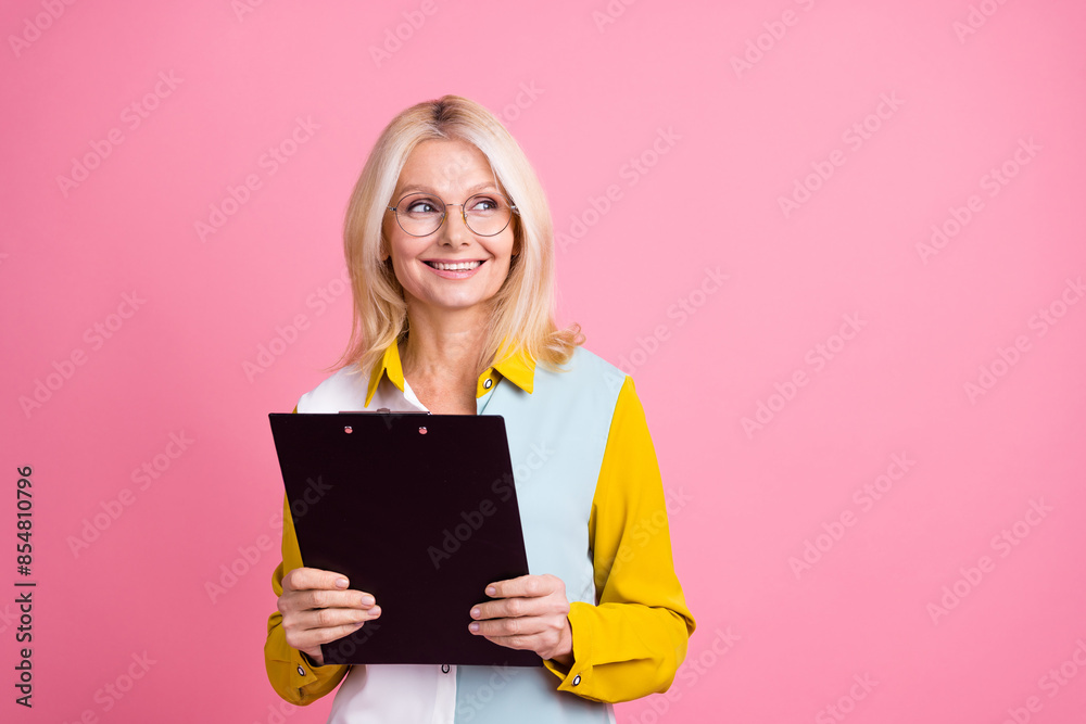 custom made wallpaper toronto digitalPhoto portrait of attractive young woman point look empty space dressed stylish colorful clothes isolated on yellow color background