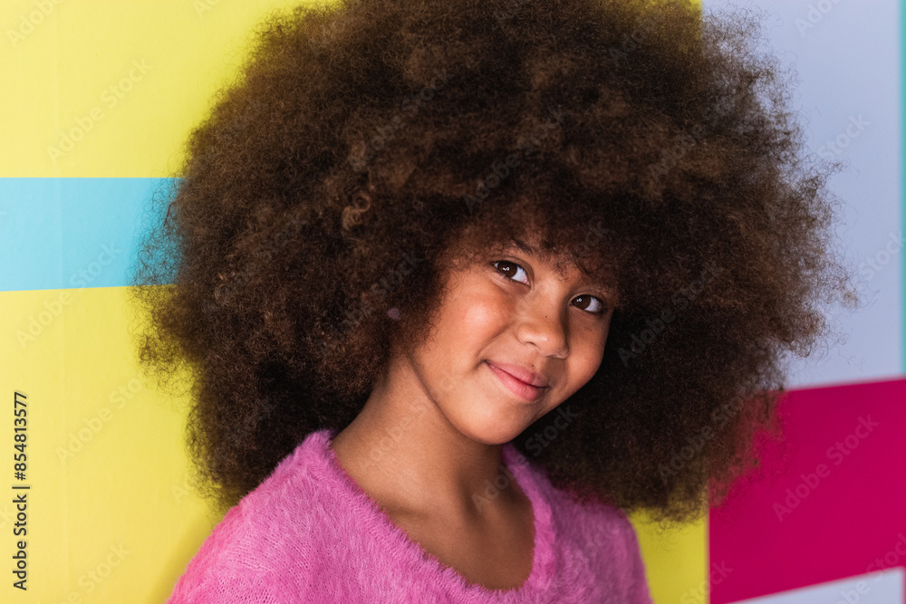Confident Afro girl looking at camera Confident Afro girl looking at camera