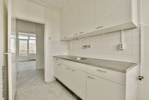 Wallpaper Mural Spacious white kitchen with balcony view at Honselerdijkstraat 26 Torontodigital.ca