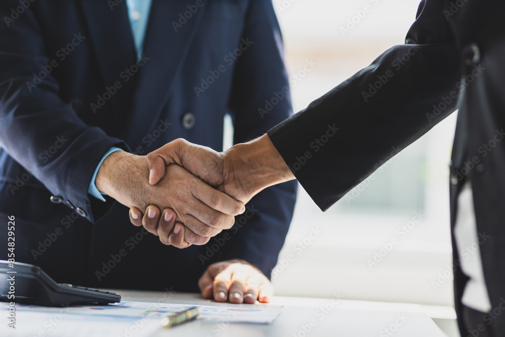custom made wallpaper toronto digitalHandshake, Business cooperation at a meeting of business people. Business partners shaking hands in a meeting.