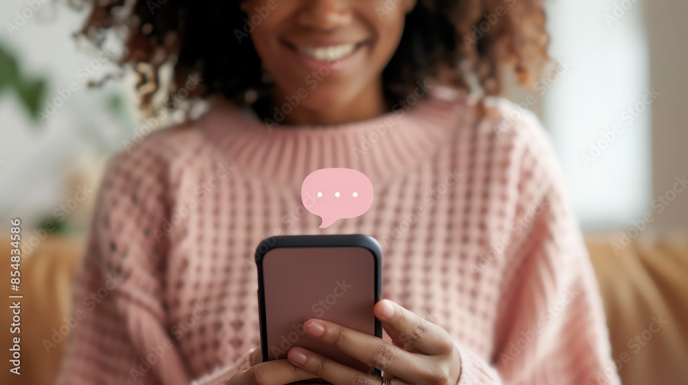 Happy woman using smartphone for texting in cozy home environment, social media interaction, and communication concept. Happy woman using smartphone for texting in cozy home environment, social media interaction, and communication concept.