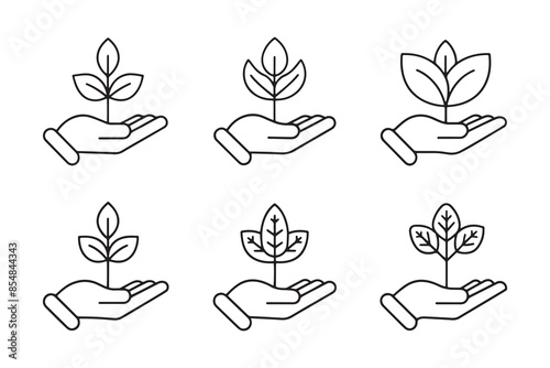 Hand holding a plant or sprout editable stroke outline icon isolated on white background photo