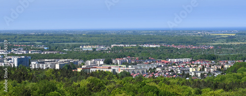 View of the city. Above the city. Aerial view of streets and houses in Koszalin, Poland. View from the observation tower in Góra Chełmska. 