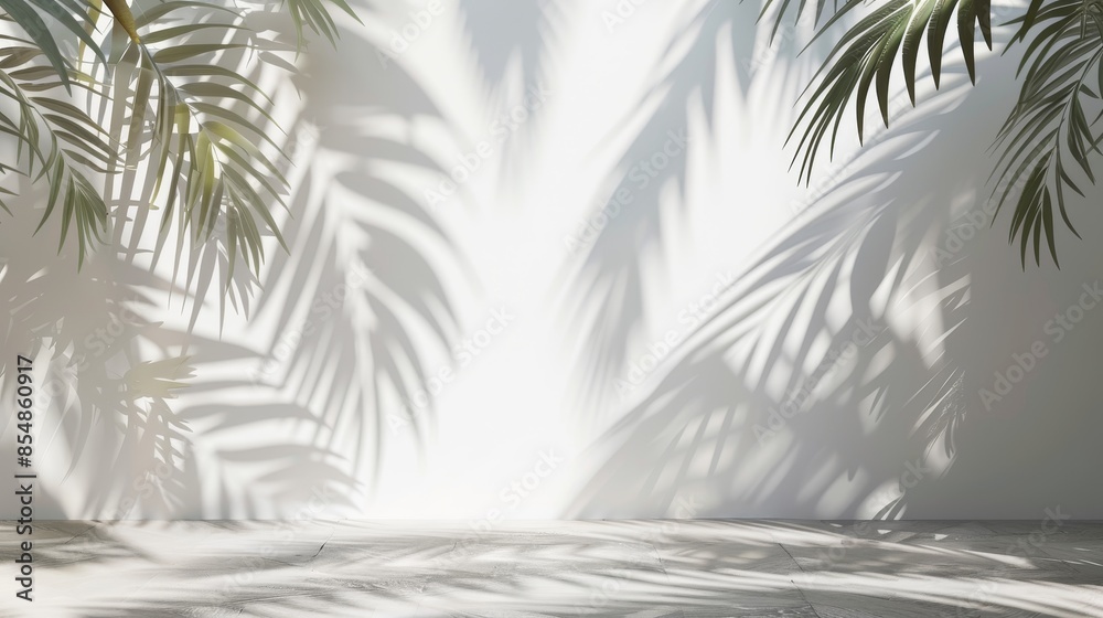 Obraz premium Tropical palm tree leaves shadow silhouette on white wall surface, coconut leaf overlay for designing summer or spring elements, mock-up for product presentation.