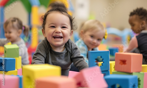 toddler or baby doing activities happily and having fun.