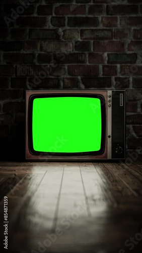 Retro TV turns on with noise, then reveals a green screen. Night horror mood. Includes luma matte and chroma key. Vertical format for reels or social media. 3D render
