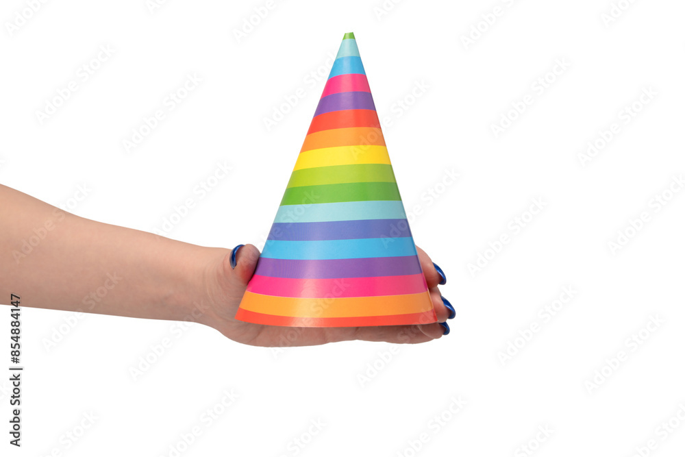 Colorful birthday cap in woman hands isolated on white background Colorful birthday cap in woman hands isolated on white background